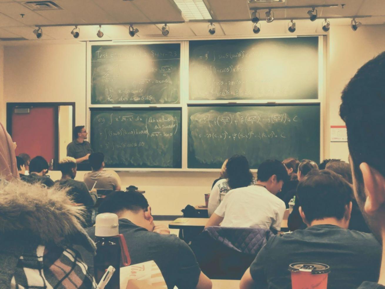 Early workshop session showing students learning budget fundamentals